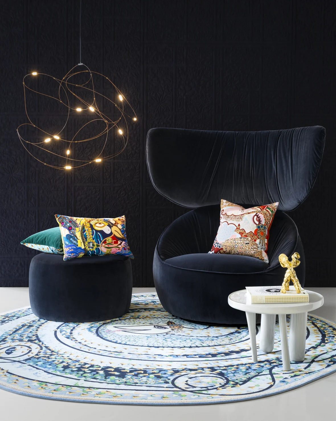 Hana Wingback chair in set with flock of light Elements table and Bisanto carpet and pillows